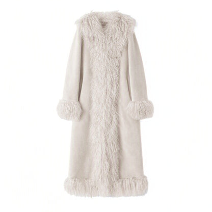 A long, open-front coat in a light cream or off-white wool fur material, featuring a shawl collar, long sleeves with matching  fur cuffs, and a fringed hem